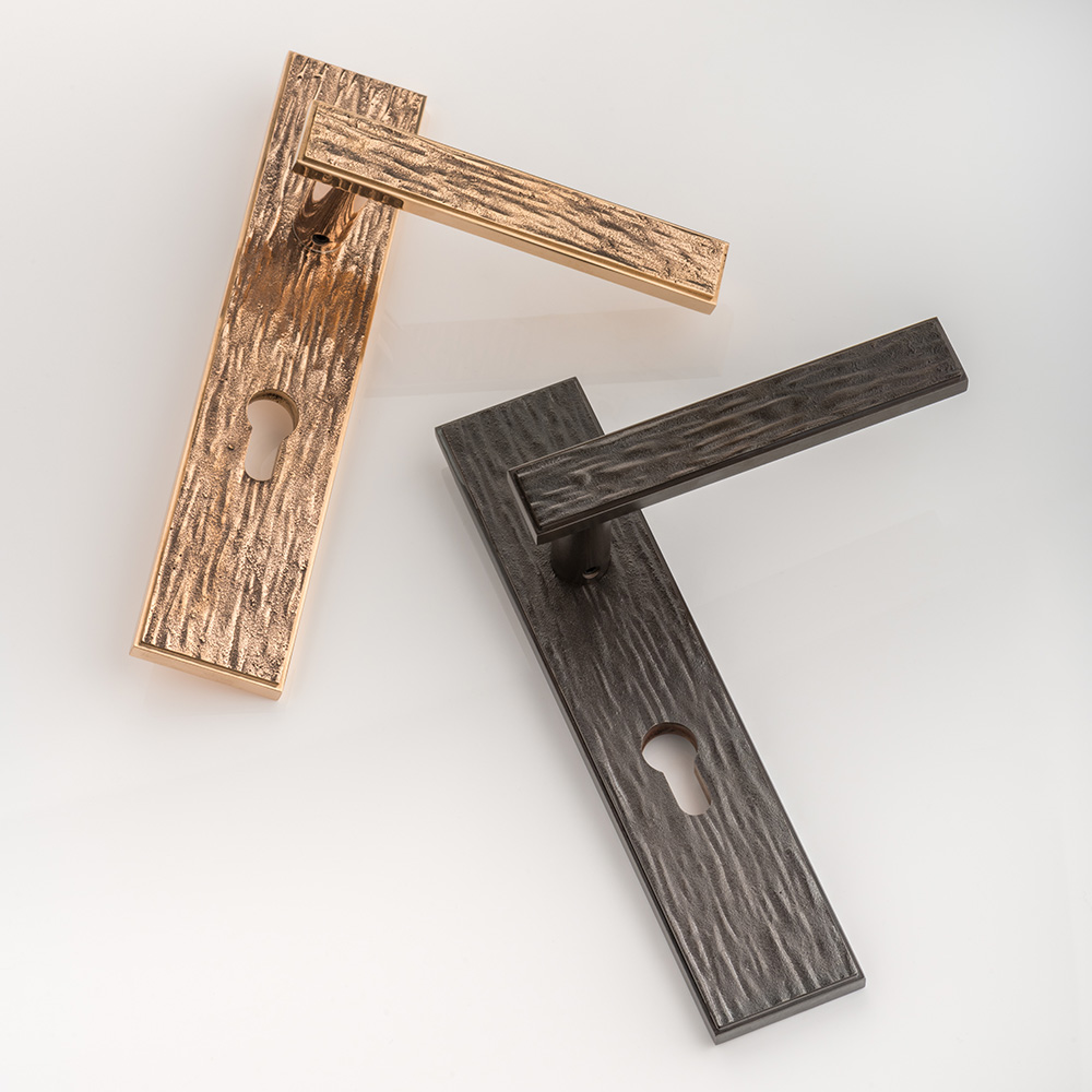 Molten texture solid bronze door lever handle with euro cut out backplate