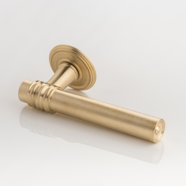 Remmington solid brass door lever handle with ornate rose