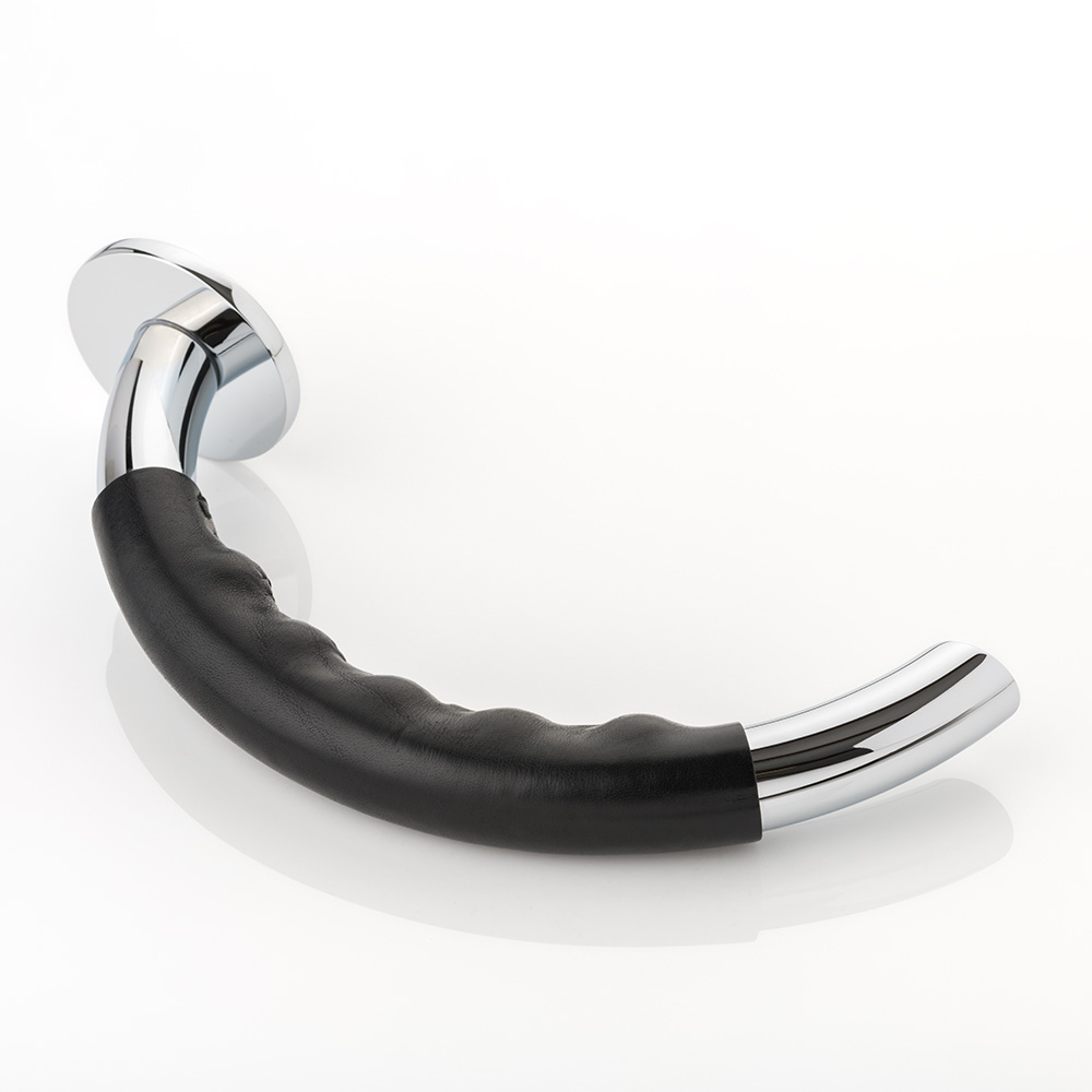 Infinity II solid brass door lever handle with hand stitched leather & round rose