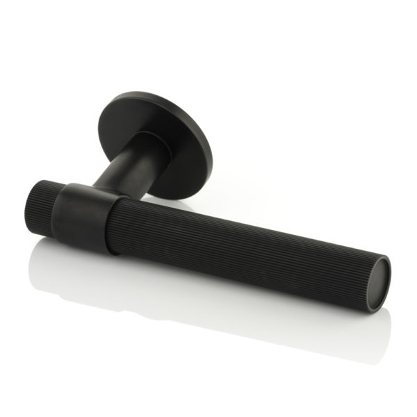 Montgomery solid brass door lever handle with linear knurl & round rose