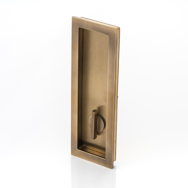 Rectangular solid brass recessed pull with privacy turn/release