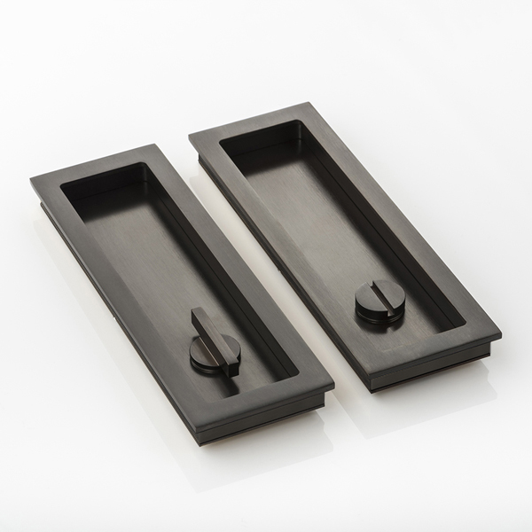 Rectangular solid brass recessed pull with privacy turn/release