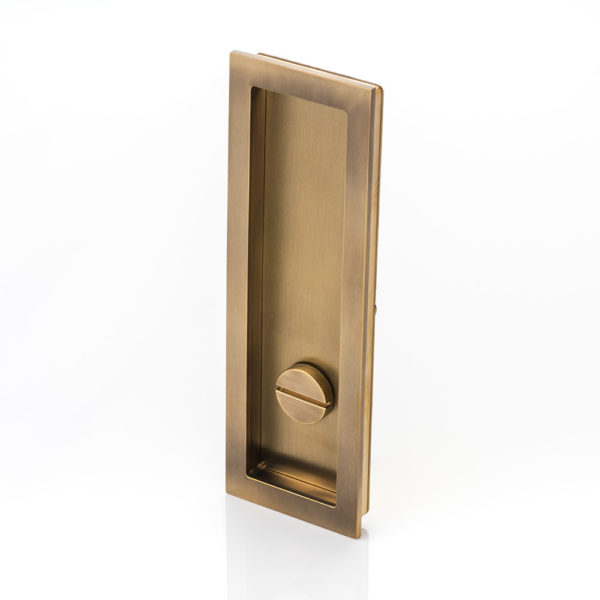 Rectangular solid brass recessed pull with privacy turn/release