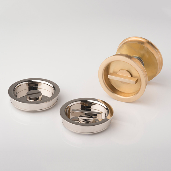Round solid brass recessed pull with privacy turn/release