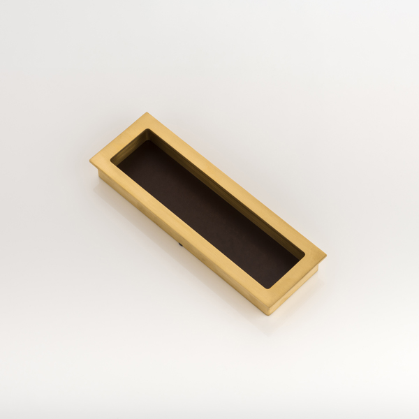 Rectangular solid brass recessed pull with bridle leather