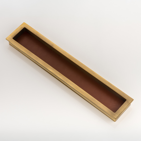 Rectangular solid brass recessed pull with bridle leather