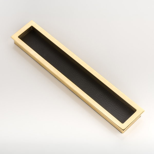 Rectangular solid brass recessed pull with bridle leather