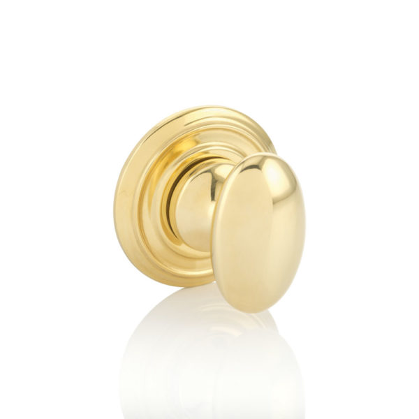 Oval thumb turn with ornate rose