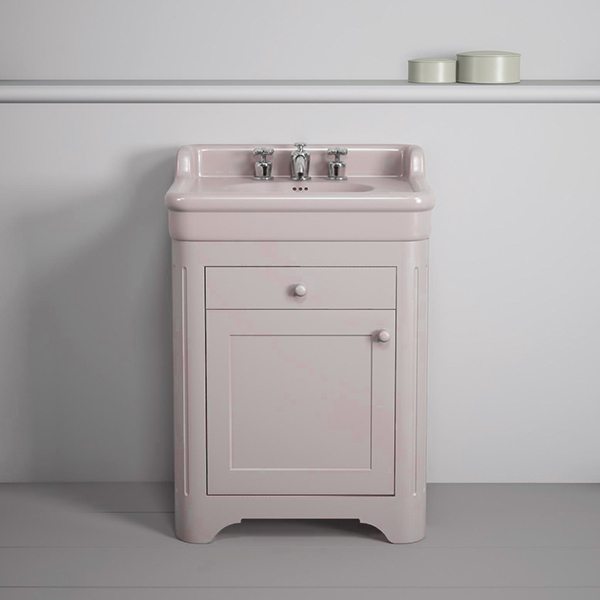 Rockwell 680mm basin with upstand in Pale Pink on timber cabinet